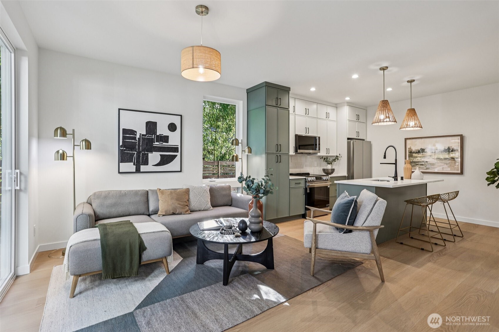 13748 Stone Avenue North Seattle, WA 98133 - Photo 5 of 22 a living room with furniture and a large window