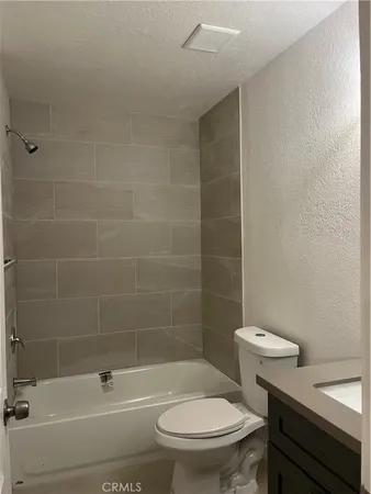 a view of a kitchen with a sink