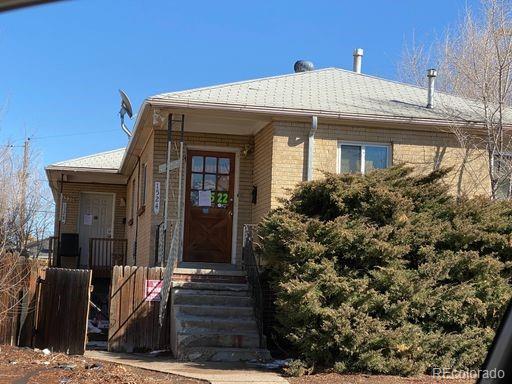 1528 Ulster Street Denver, CO 80220 - Photo 2 of 8 a front view of a house