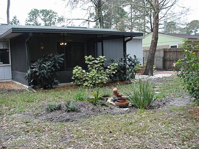3165 Ricky Drive Jacksonville, FL 32223 - Photo 8 of 8 a view of a garden