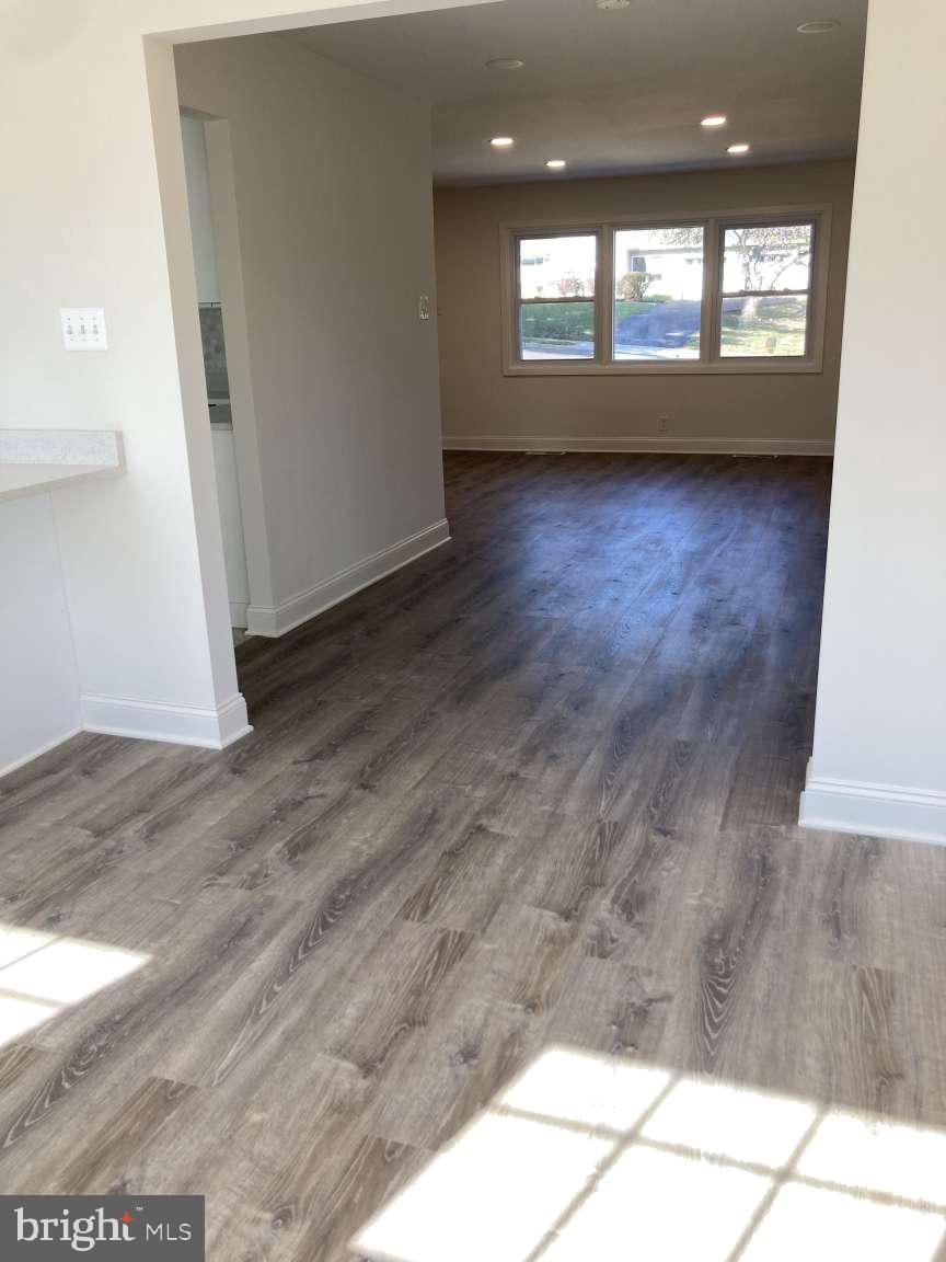 806 Rhodes Avenue Jenkintown, PA 19046 - Photo 12 of 16 a view of an empty room and window