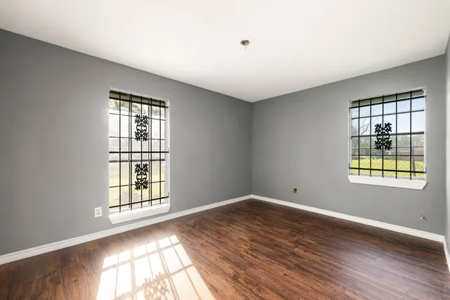 a view of an empty room and window
