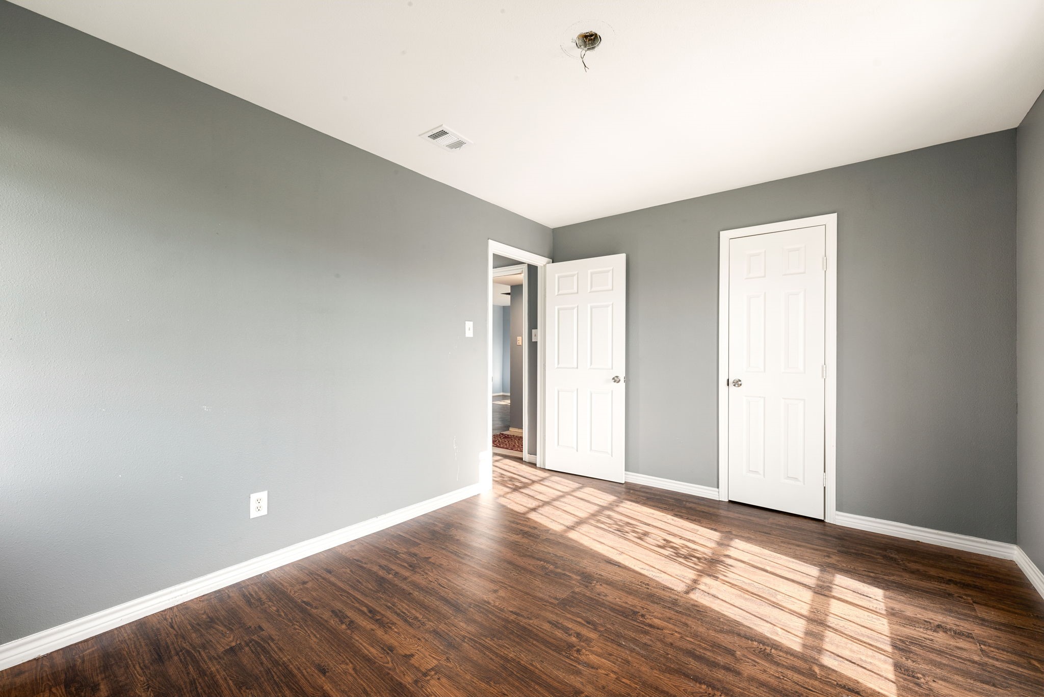 6515 Ashton Street Houston, TX 77091 - Photo 14 of 32 a view of an empty room and window