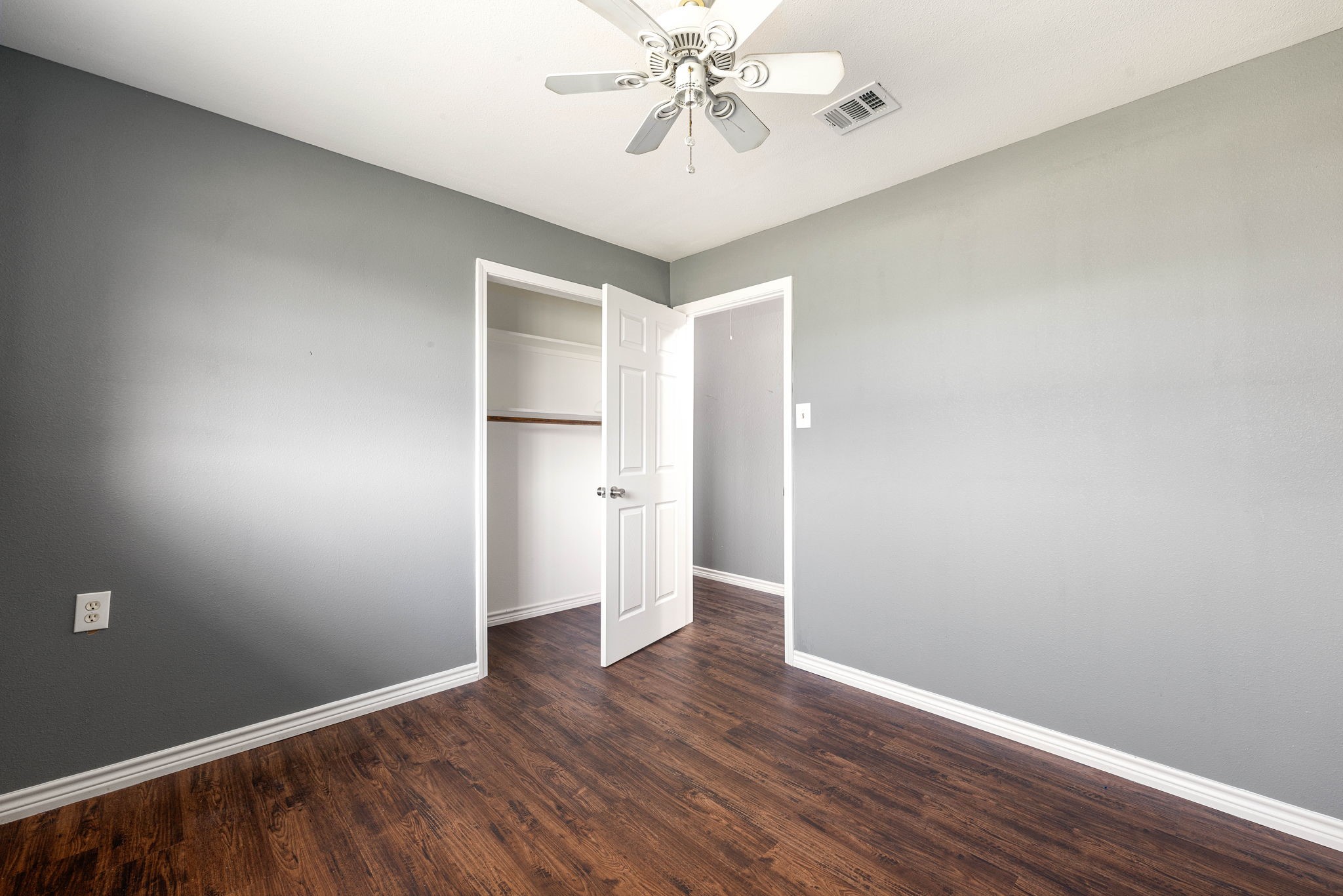 6515 Ashton Street Houston, TX 77091 - Photo 17 of 32 wooden floor in an empty room with a window