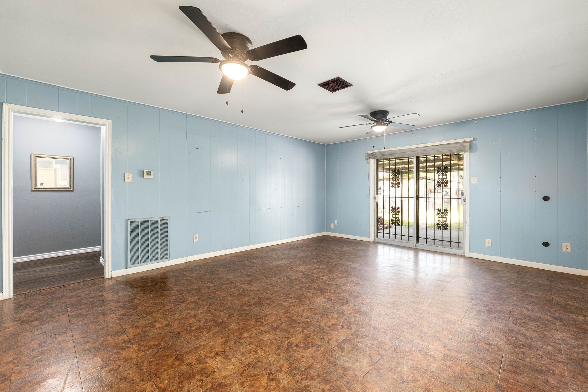 6515 Ashton Street Houston, TX 77091 - Photo 20 of 32 a view of an empty room with a window