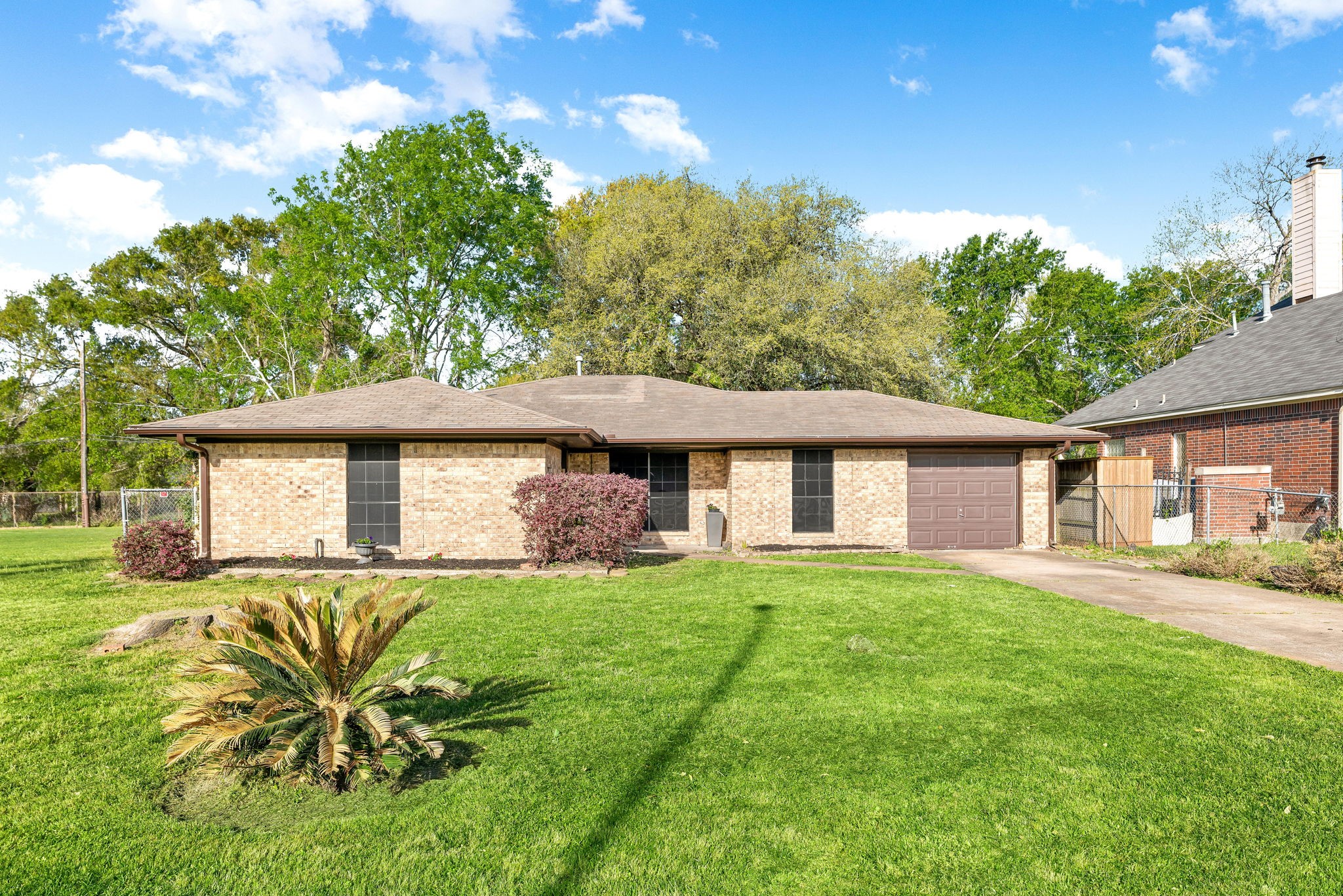 6515 Ashton Street Houston, TX 77091 - Photo 2 of 32 a house view with a garden space