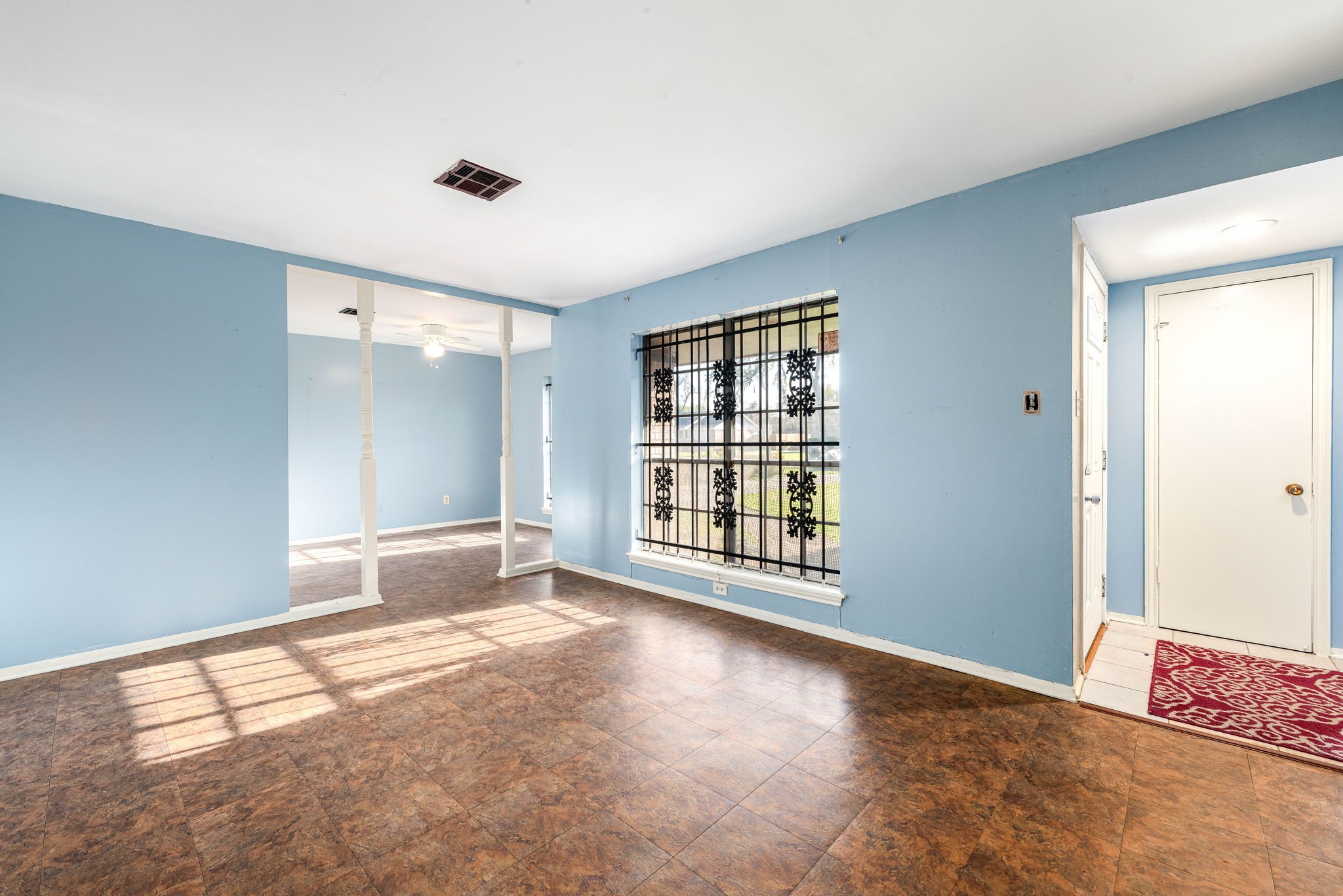 6515 Ashton Street Houston, TX 77091 - Photo 27 of 32 a view of an empty room with a window