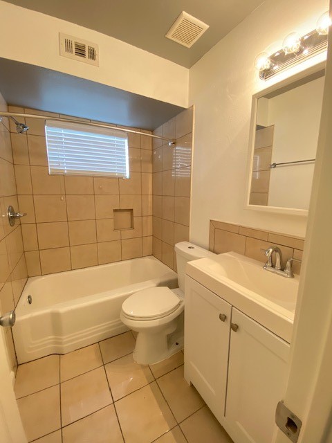 4701 Bell Street, Unit 4 Houston, TX 77023 - Photo 11 of 19 a bathroom with a sink toilet and shower