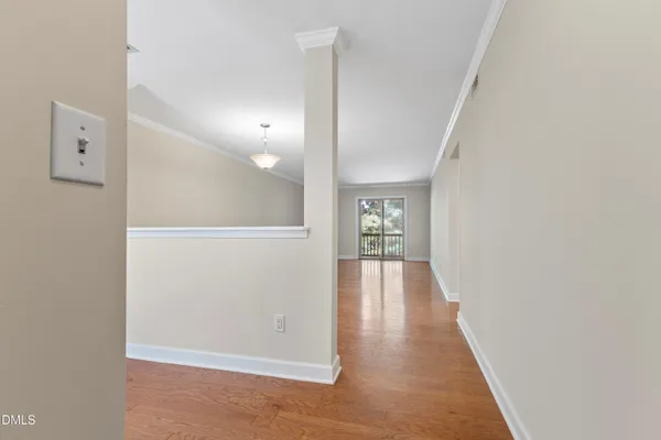wooden floor in a hall with an entryway