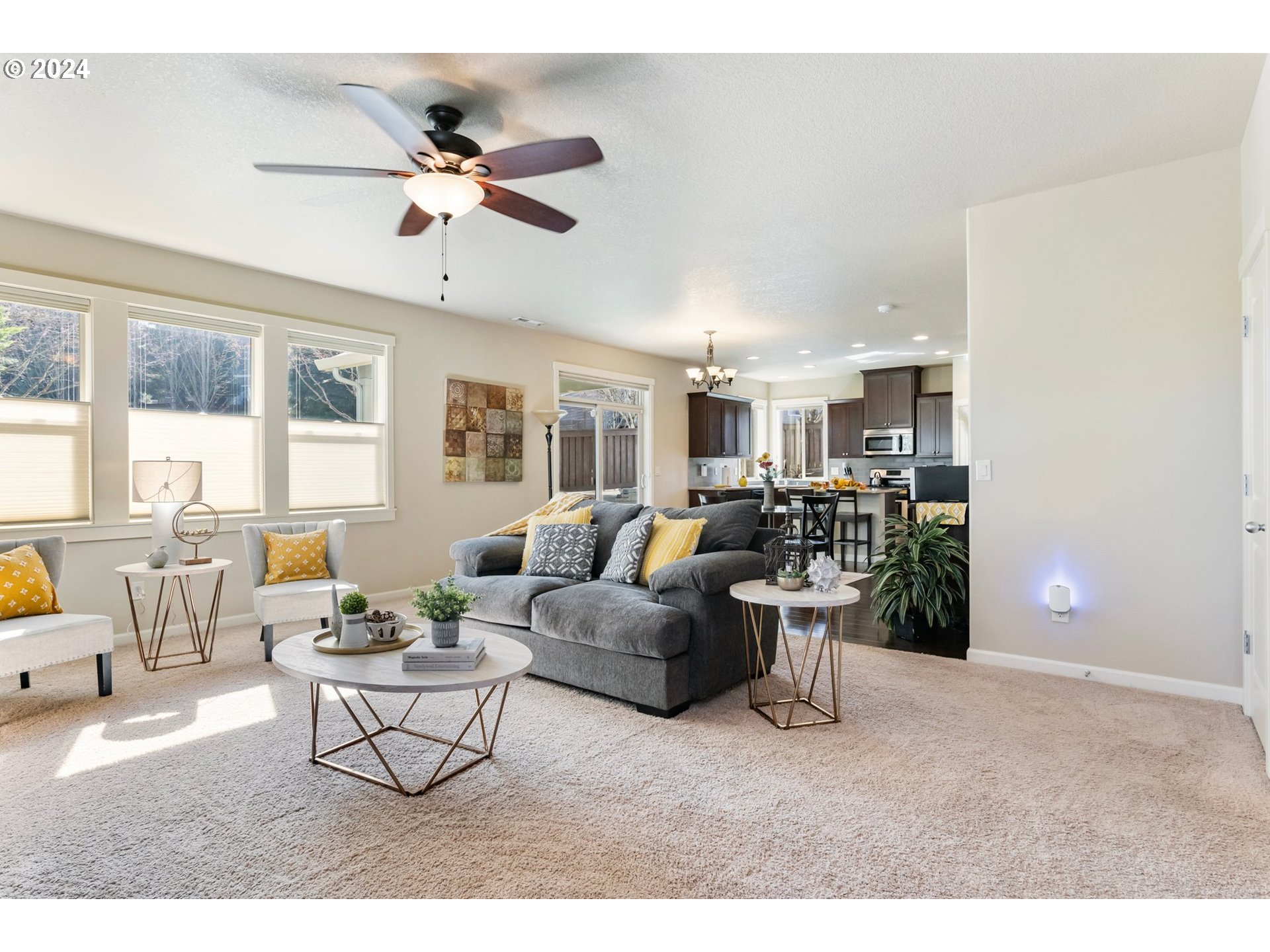 4411 North 4th Circle Ridgefield, WA 98642 - Photo 8 of 38 a living room with furniture and a large window