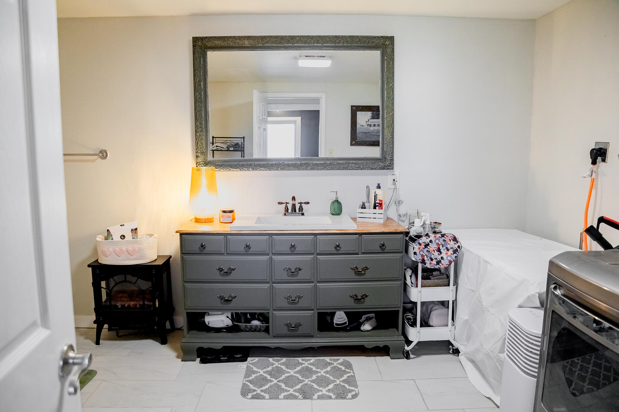 1398 County Road 155 Post, TX 79356 - Photo 19 of 26 a bathroom with a sink and a mirror