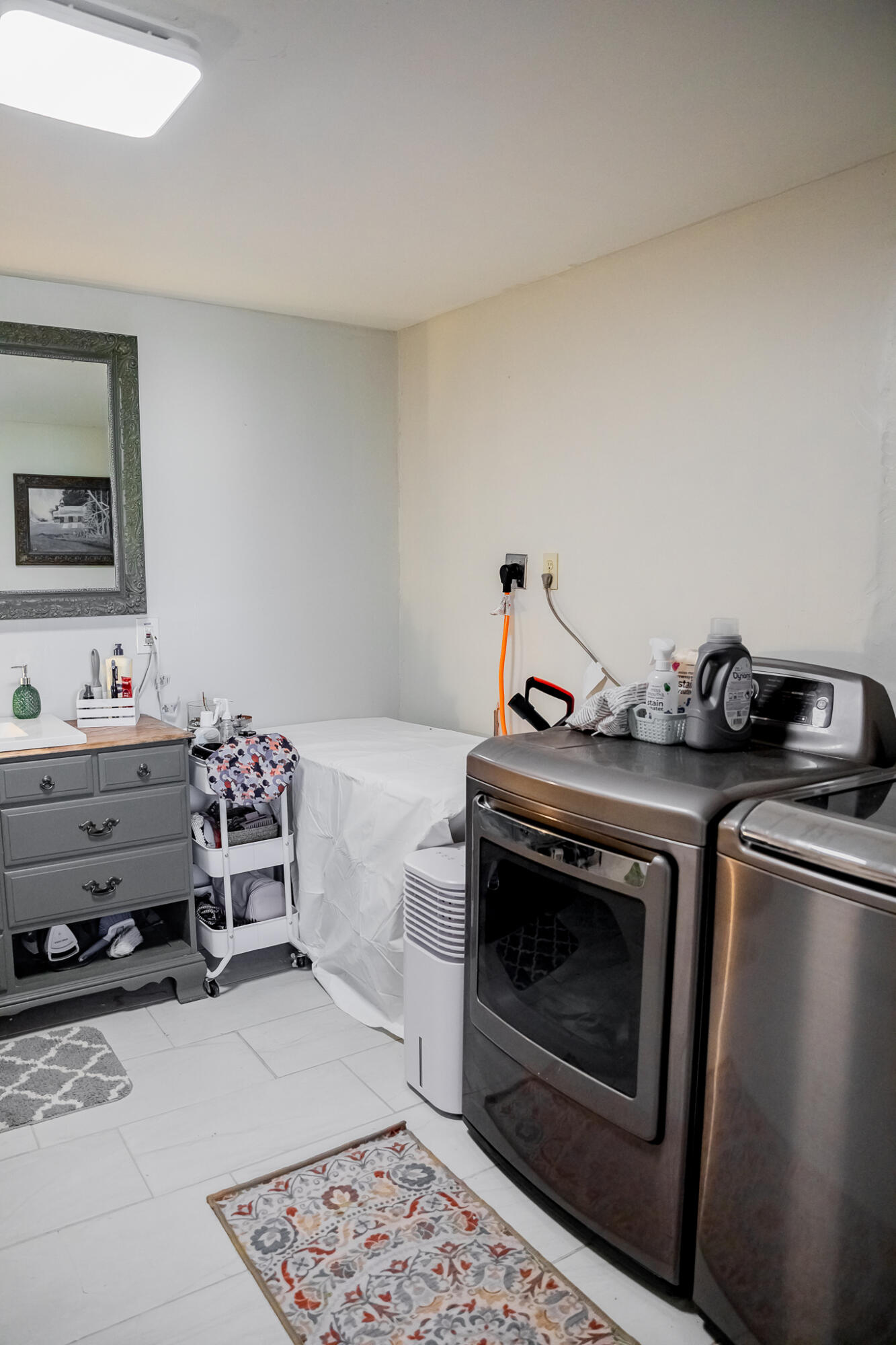 1398 County Road 155 Post, TX 79356 - Photo 20 of 26 a storage room with washer and dryer