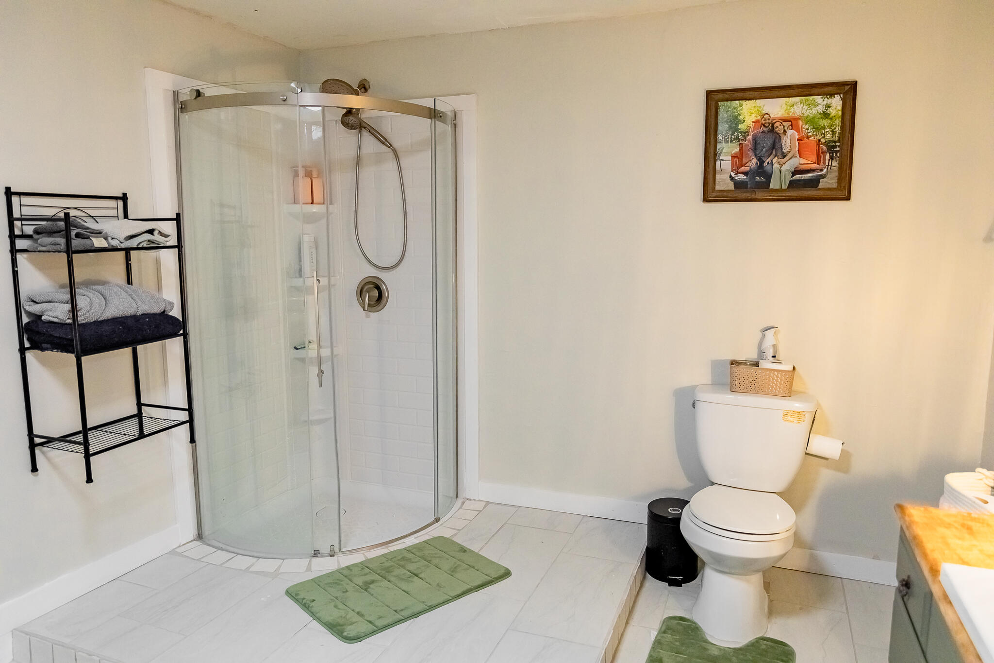 1398 County Road 155 Post, TX 79356 - Photo 21 of 26 a white toilet sitting next to a bathroom sink