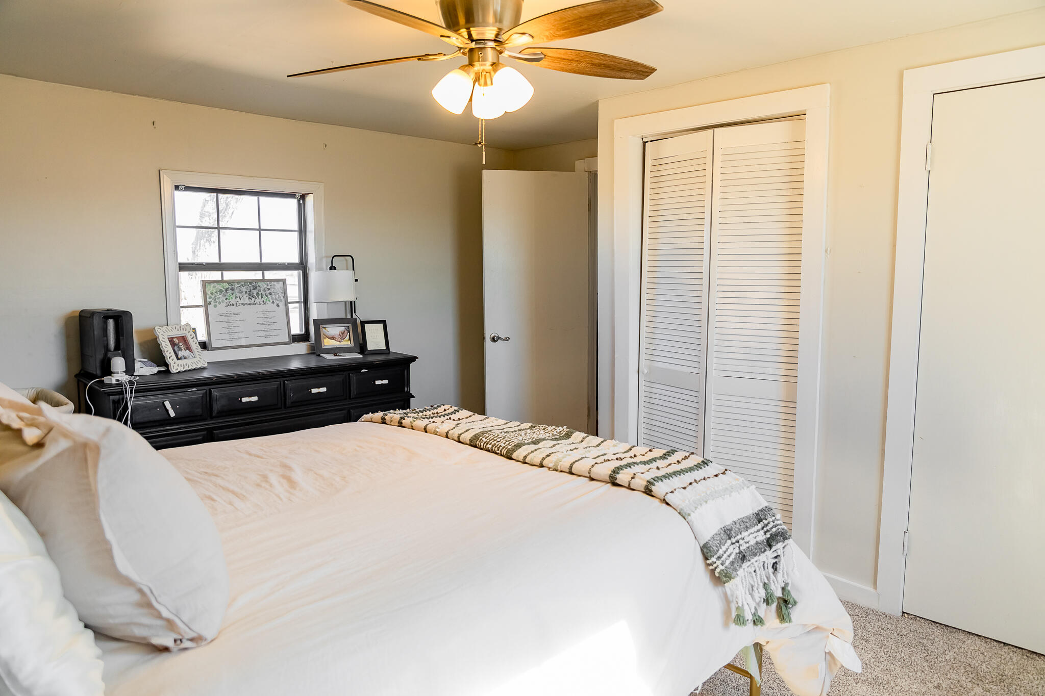 1398 County Road 155 Post, TX 79356 - Photo 23 of 26 a bedroom with a bed and window