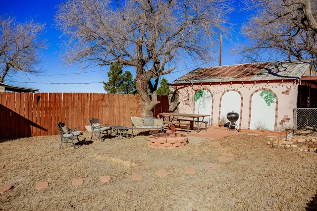 a view of a chairs and tables in the patio