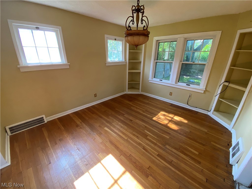 3630 Bainbridge Road Cleveland Heights, OH 44118 - Photo 6 of 21 Unfurnished bedroom featuring hardwood / wood-style flooring