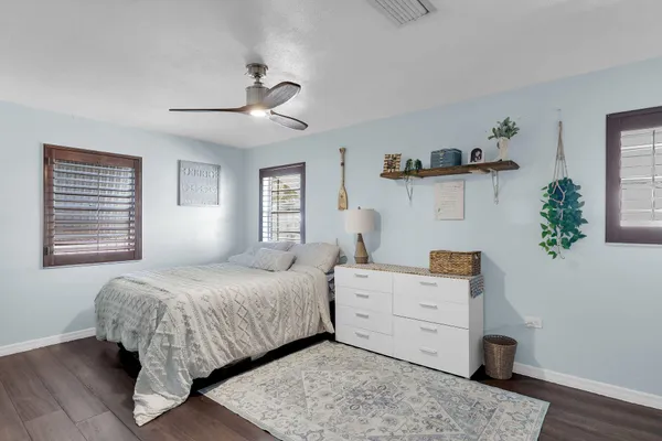 a room with a bed and a window