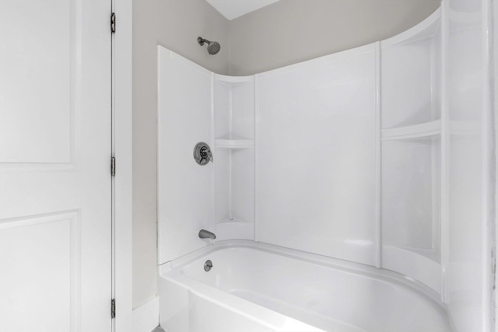2 Perkins Street Amesbury, MA 01913 - Photo 15 of 36 a bathroom with a bathtub