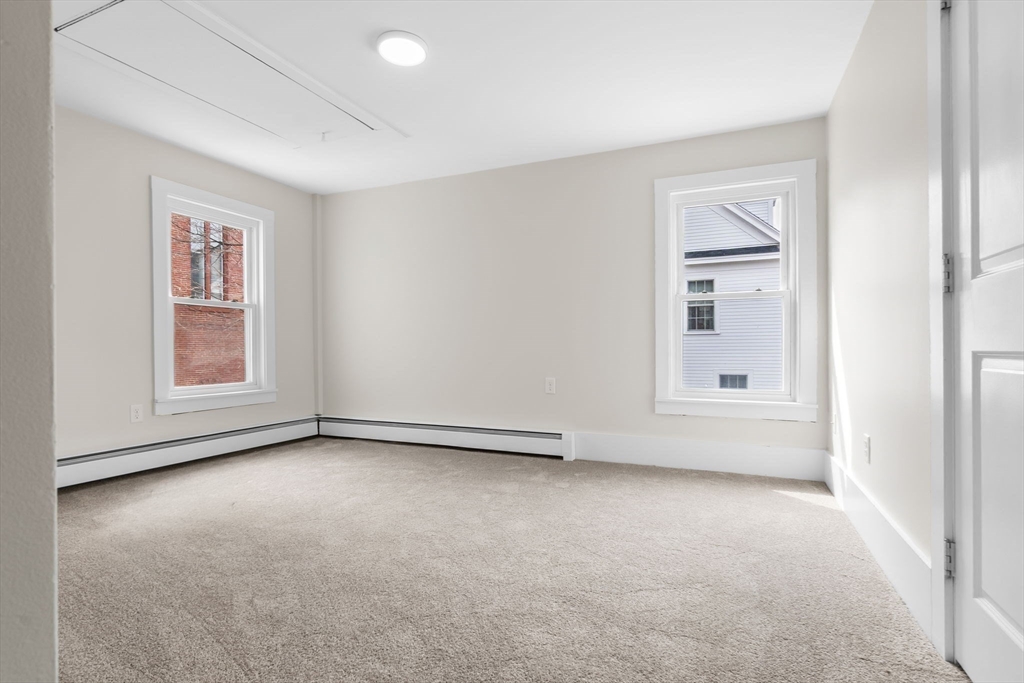 2 Perkins Street Amesbury, MA 01913 - Photo 21 of 36 an empty room with windows