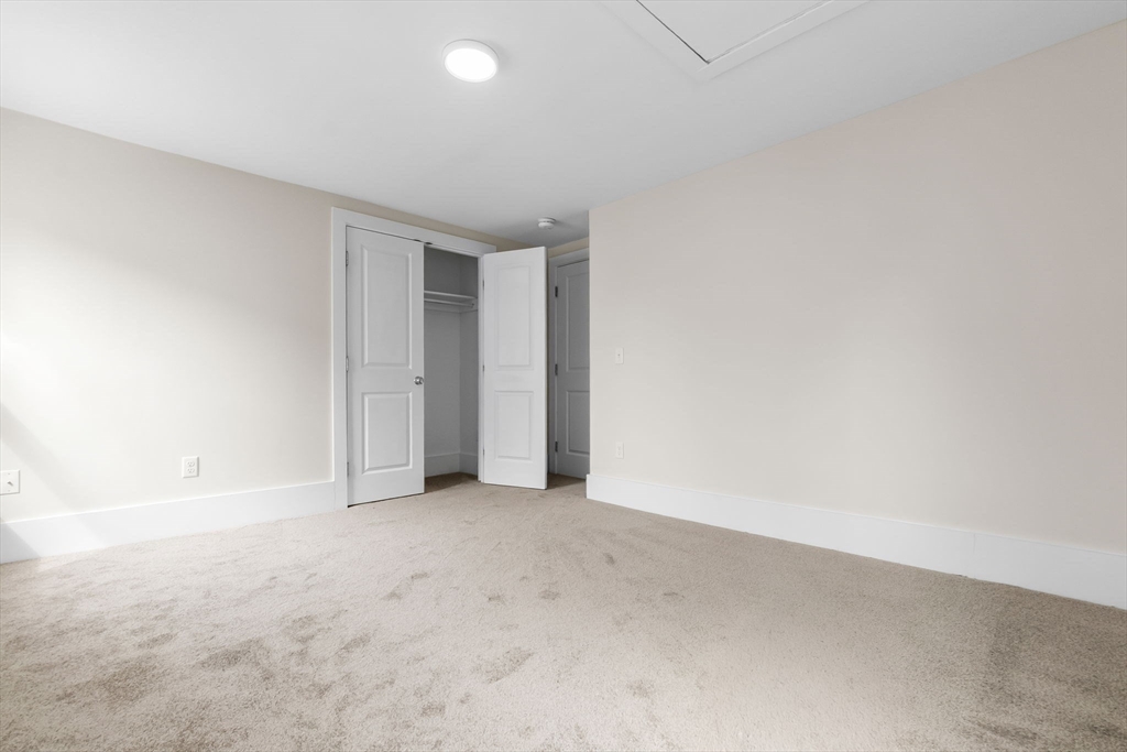 2 Perkins Street Amesbury, MA 01913 - Photo 22 of 36 an empty room with an entryway