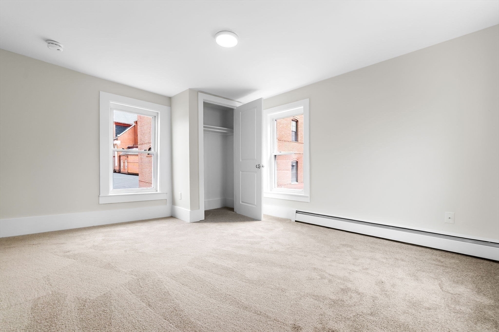 2 Perkins Street Amesbury, MA 01913 - Photo 25 of 36 an empty room with windows