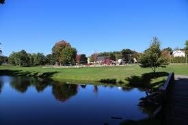 2 Perkins Street Amesbury, MA 01913 - Photo 35 of 36 a view of a lake with a yard and large trees