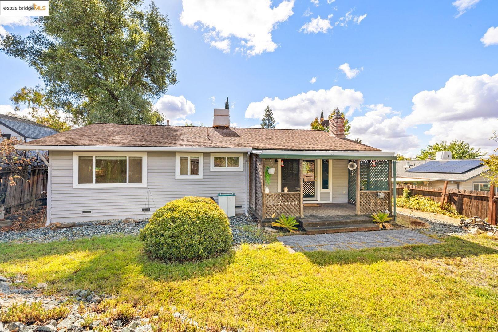 10562 Suzanne Court Jamestown, CA 95327 - Photo 3 of 14 a view of a house with swimming pool and sitting area