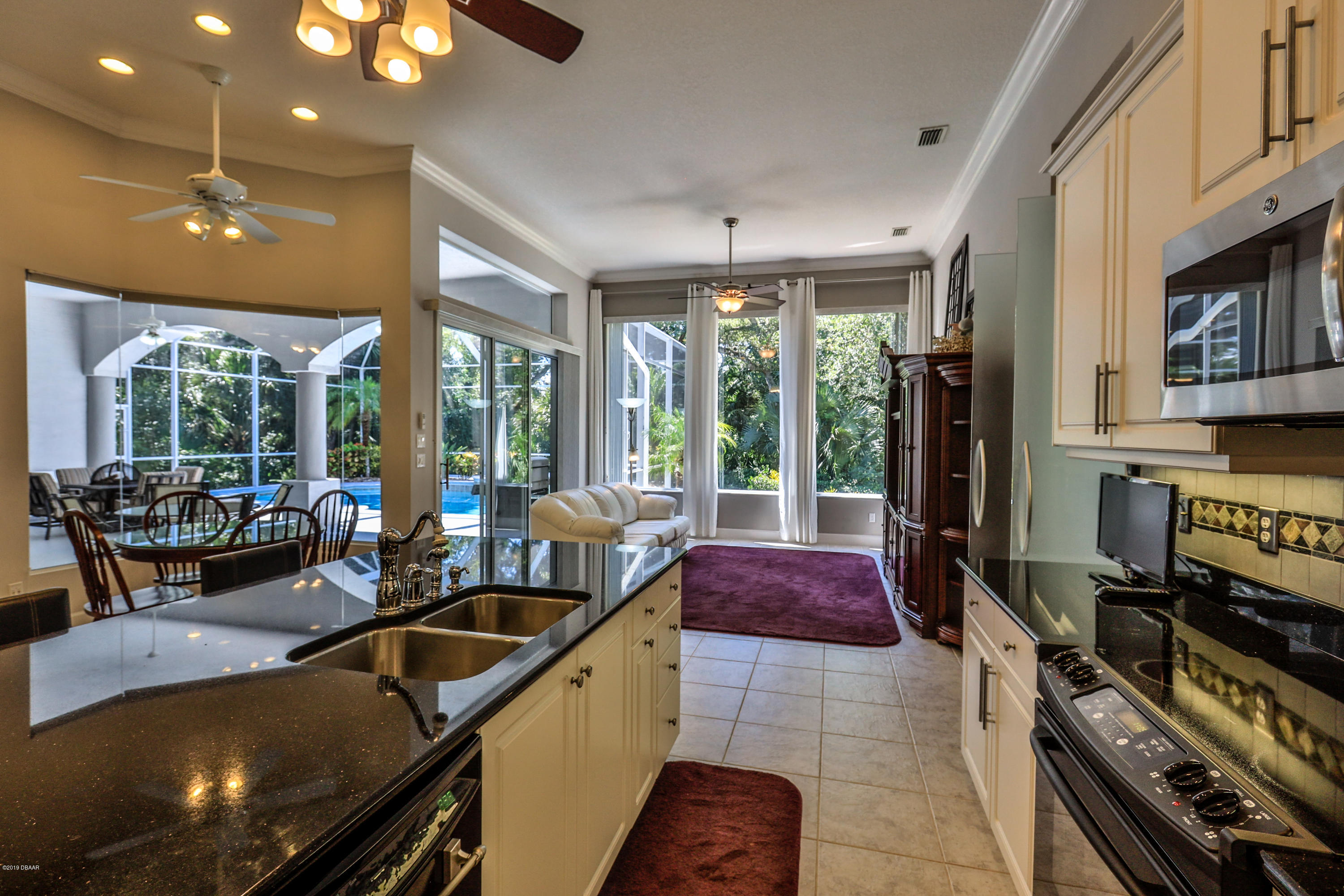 117 Beach Street Ponce Inlet, FL 32127 - Photo 17 of 37 a very nice looking dining room with a large window