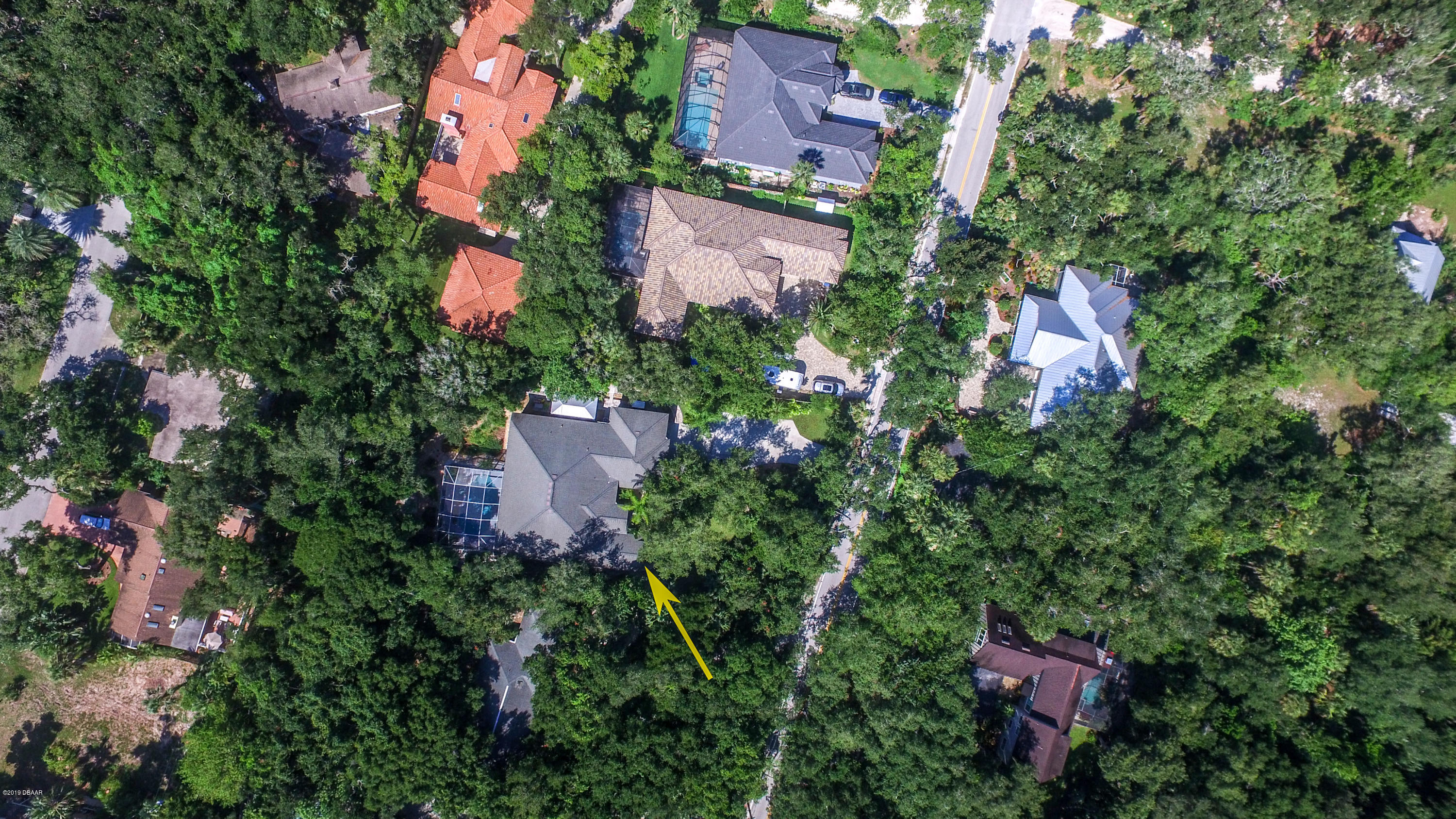 117 Beach Street Ponce Inlet, FL 32127 - Photo 29 of 37 an aerial view of residential house with outdoor space and trees all around