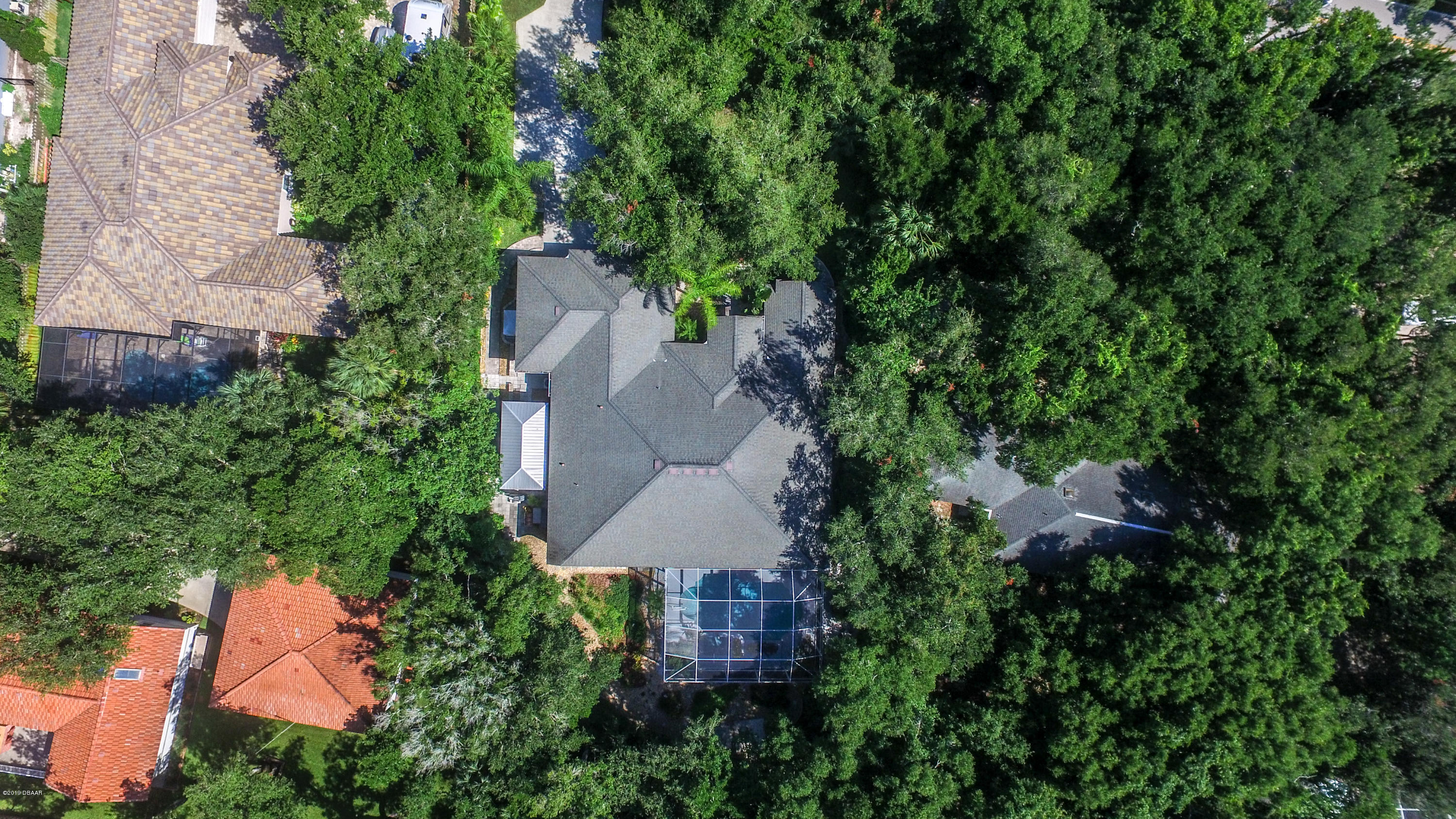 117 Beach Street Ponce Inlet, FL 32127 - Photo 33 of 37 an aerial view of residential house with outdoor space and trees all around