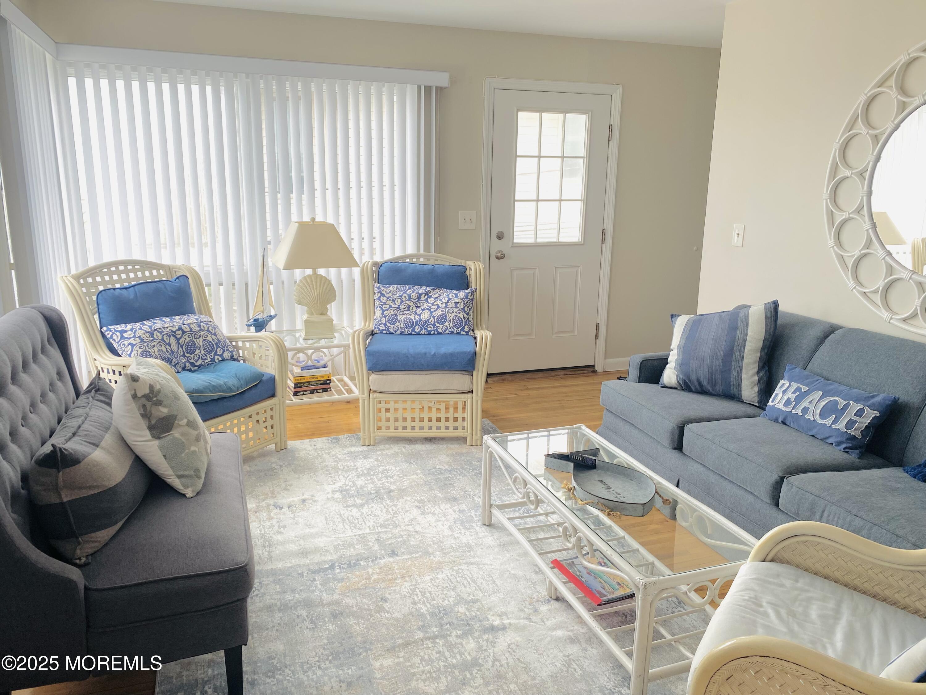 4 Camden Avenue, Unit UP Lavallette, NJ 08735 - Photo 2 of 10 a living room with furniture and a large window