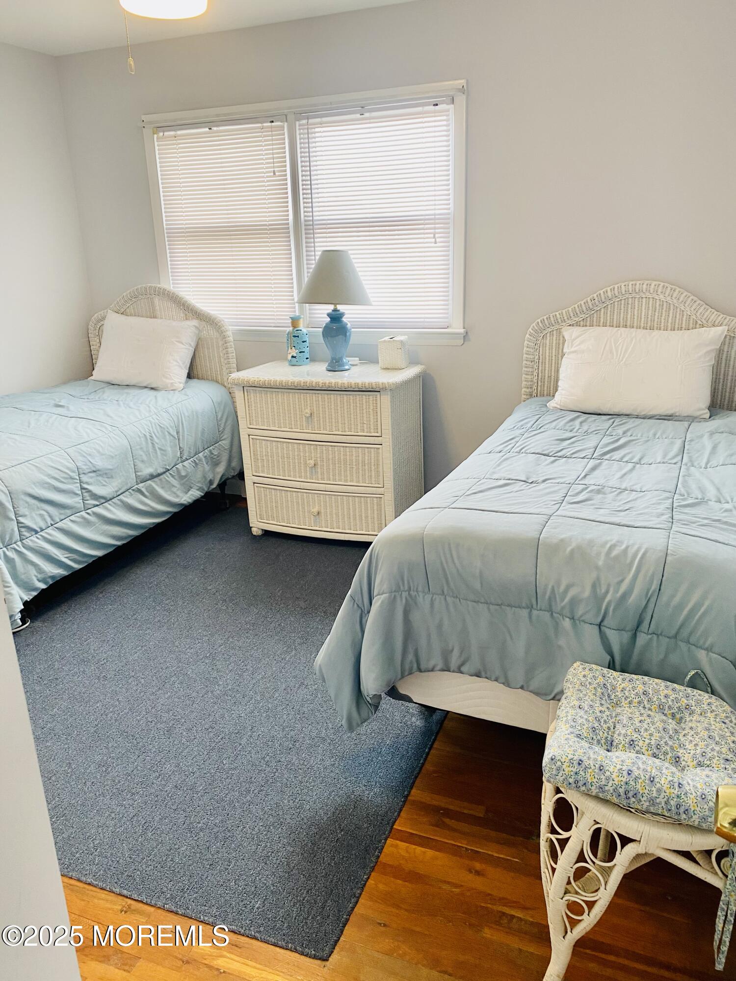 4 Camden Avenue, Unit UP Lavallette, NJ 08735 - Photo 4 of 10 a bedroom with a bed and window