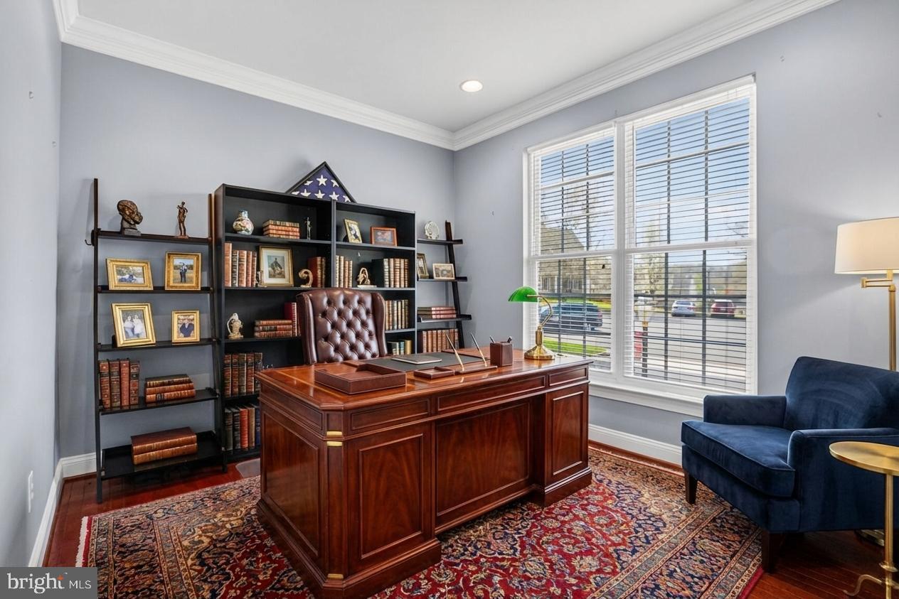 3308 McCorkle Court Triangle, VA 22172 - Photo 11 of 82 a room with furniture and a bookshelf