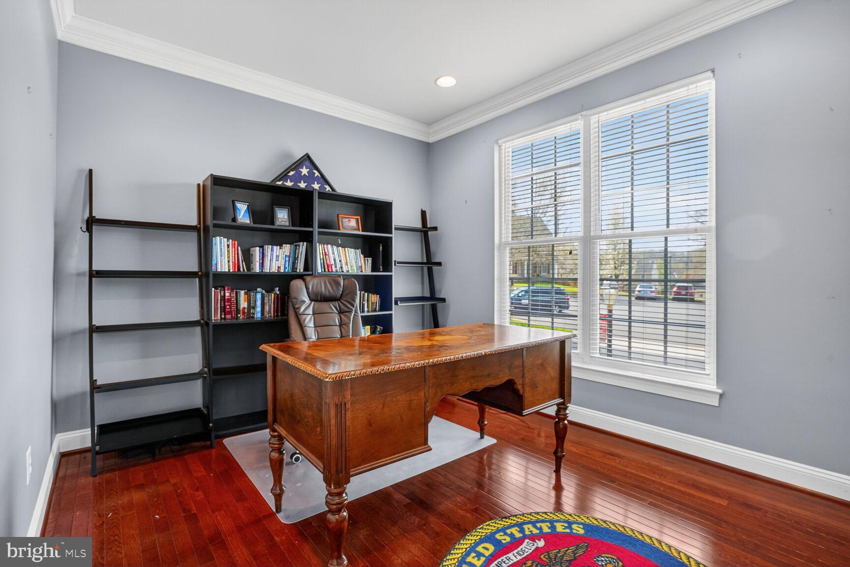 3308 McCorkle Court Triangle, VA 22172 - Photo 12 of 82 a view of a workspace with furniture and a bookshelf