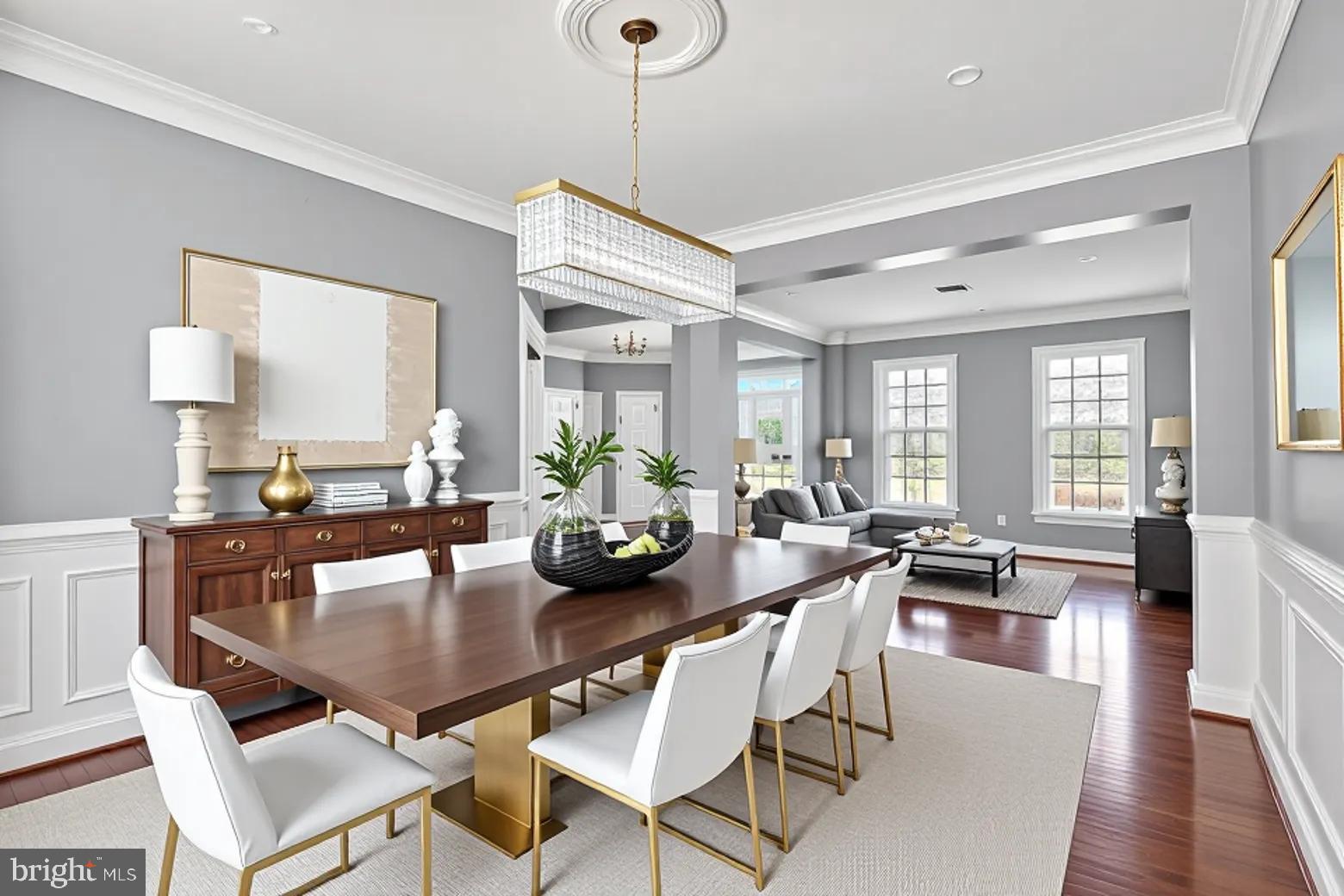 3308 McCorkle Court Triangle, VA 22172 - Photo 15 of 82 a view of a dining room and livingroom with furniture wooden floor a chandelier