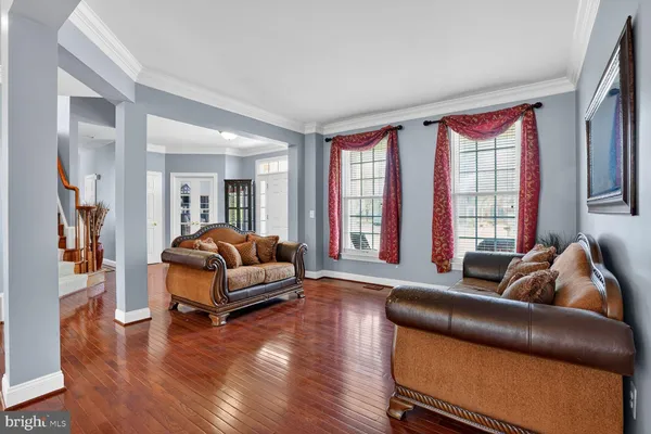 a spacious bedroom with a bed and a large window