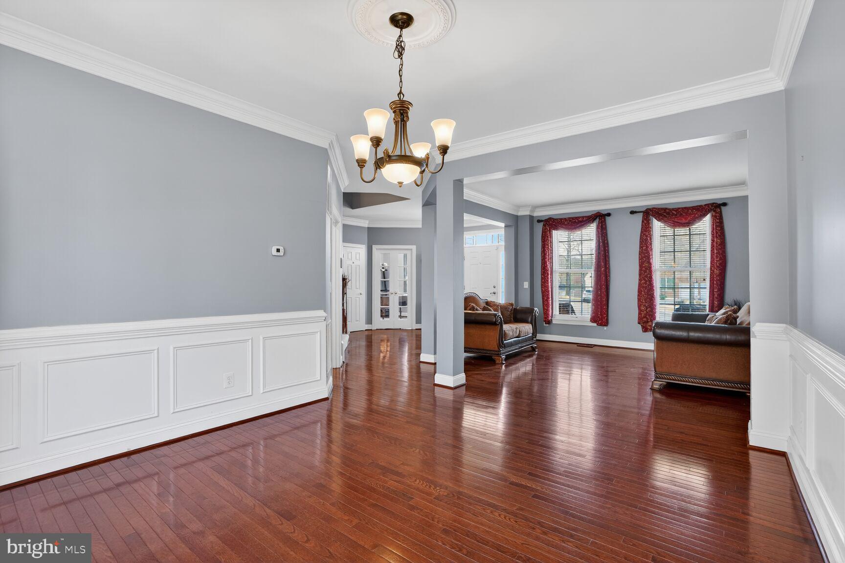 3308 McCorkle Court Triangle, VA 22172 - Photo 16 of 82 a view of an entryway with wooden floor and windows