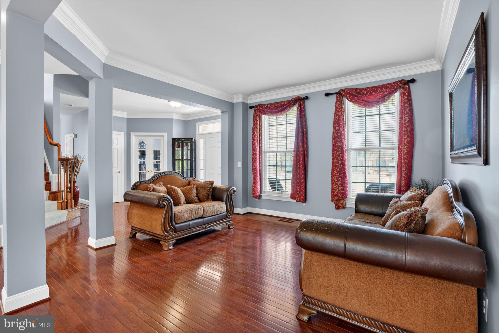 3308 McCorkle Court Triangle, VA 22172 - Photo 17 of 82 a living room with furniture and a large window