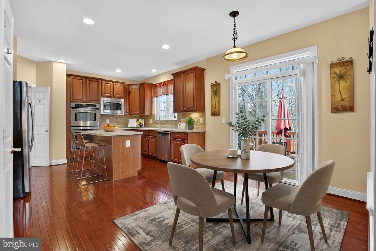 3308 McCorkle Court Triangle, VA 22172 - Photo 23 of 82 a view of a dining room with furniture window and wooden floor