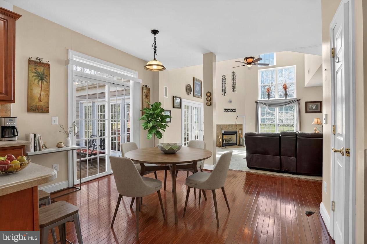 3308 McCorkle Court Triangle, VA 22172 - Photo 26 of 82 a view of a dining room with furniture window and wooden floor