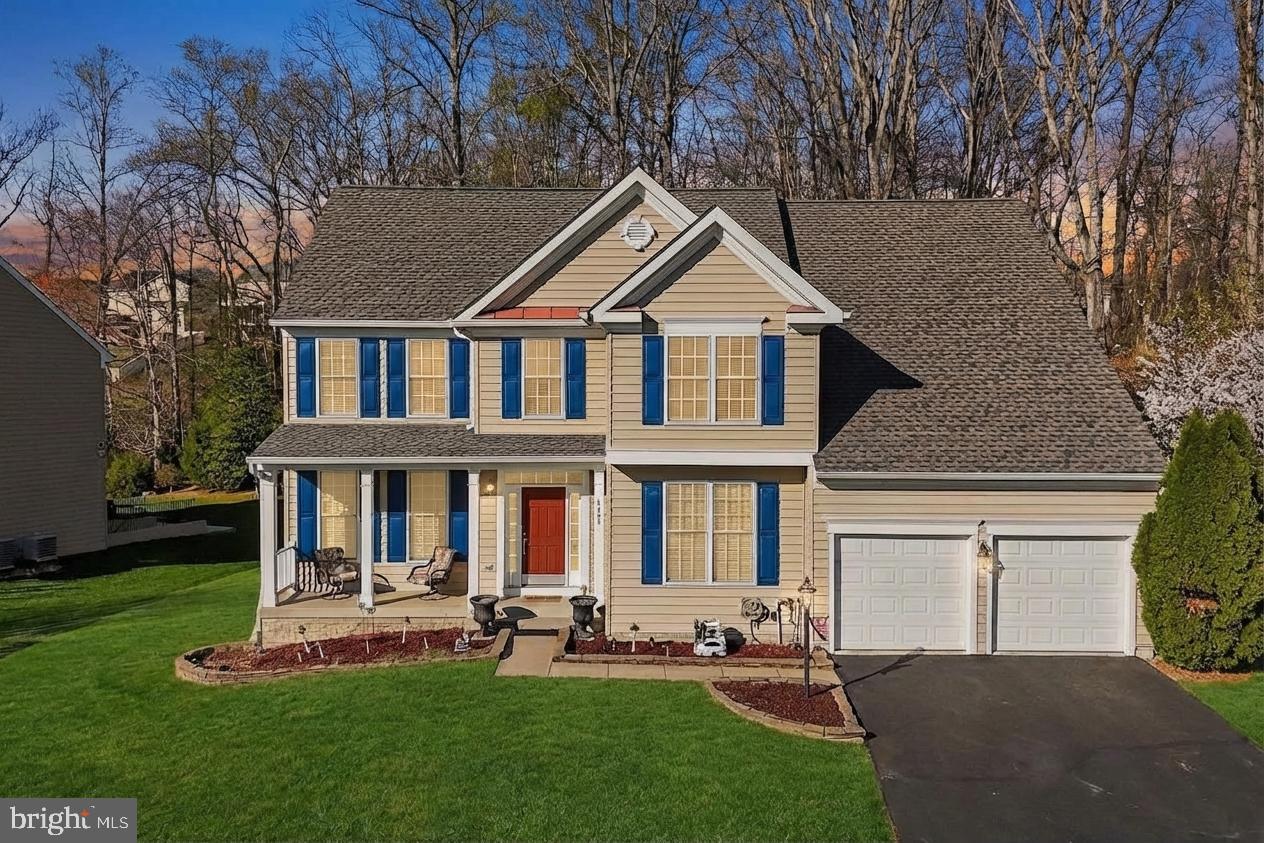 3308 McCorkle Court Triangle, VA 22172 - Photo 3 of 82 a front view of a house with a yard