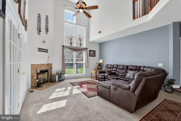 a living room with furniture and a table
