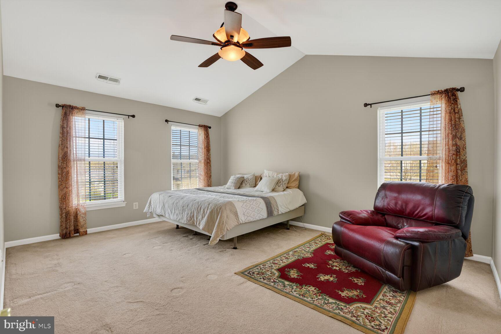3308 McCorkle Court Triangle, VA 22172 - Photo 37 of 82 a spacious bedroom with a bed furniture and a window
