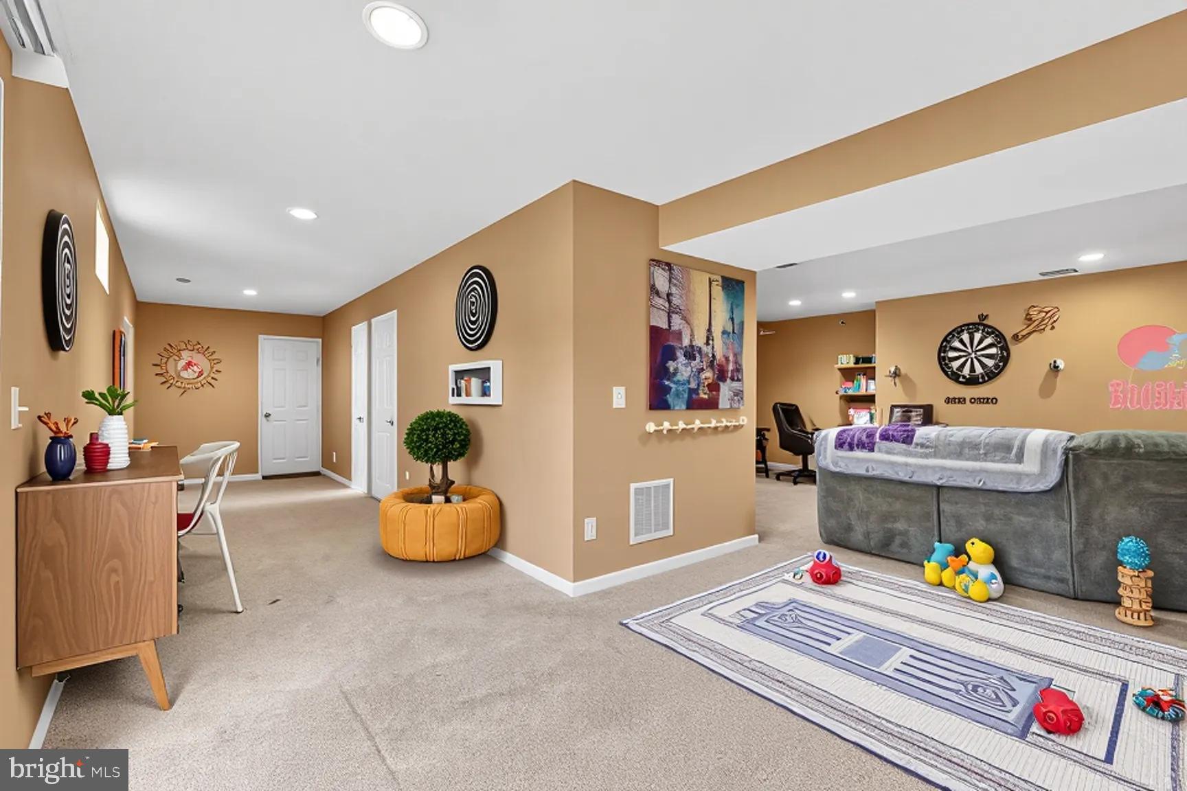 3308 McCorkle Court Triangle, VA 22172 - Photo 56 of 82 a living room with furniture and a table