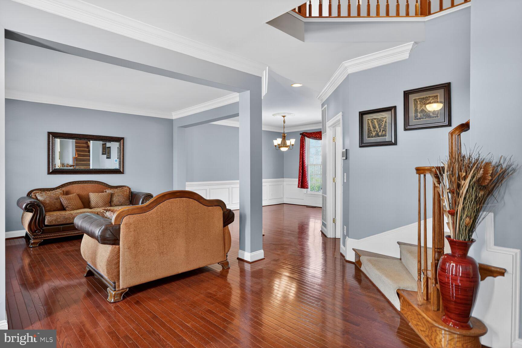 3308 McCorkle Court Triangle, VA 22172 - Photo 6 of 82 a living room with furniture and a wooden floor