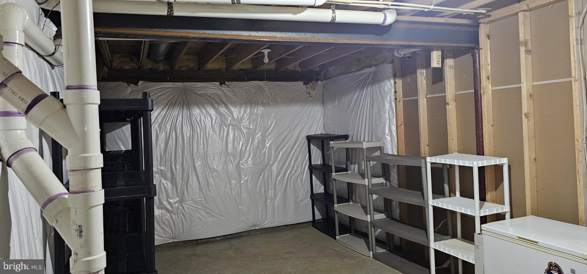 3308 McCorkle Court Triangle, VA 22172 - Photo 68 of 82 a view of walk in closet with clothes and shoes
