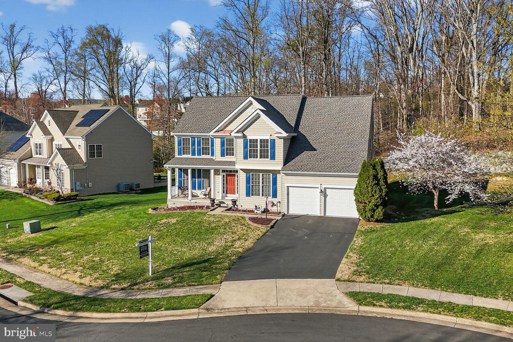 3308 McCorkle Court Triangle, VA 22172 - Photo 77 of 82 front view of a house with a yard