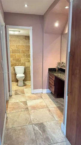 a bathroom with a sink and a toilet