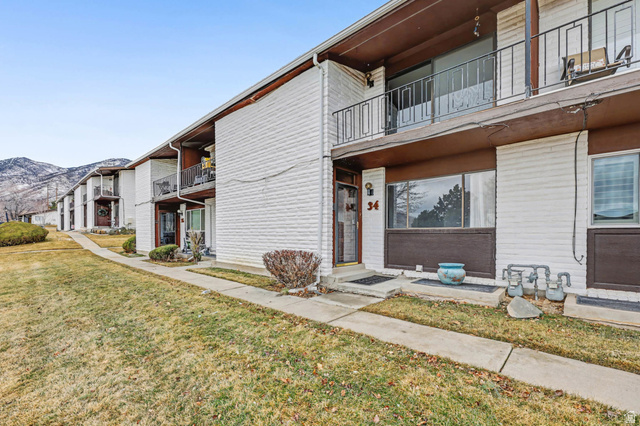 34 Benchmark Village Tooele, UT 84074 - Photo 2 of 35 View of apartment building / complex featuring a mountain view
