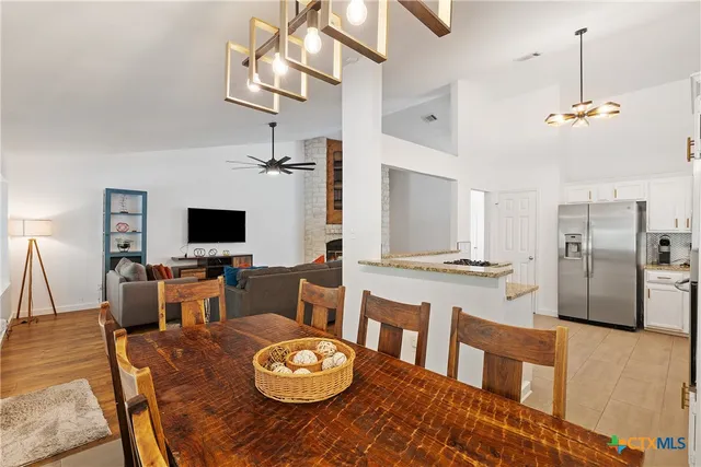 a view of a dining room with furniture